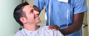 Student helping patient on their Nursing Diploma