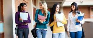 Group of students walking at higher education college